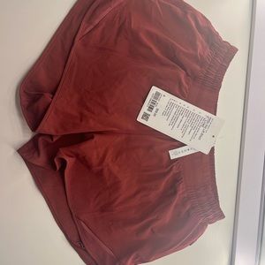 NWT Lululemon Hotty Hot 4” mulled wine size 6